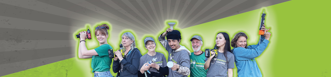 Volunteers holding tools Volunteers holding tools